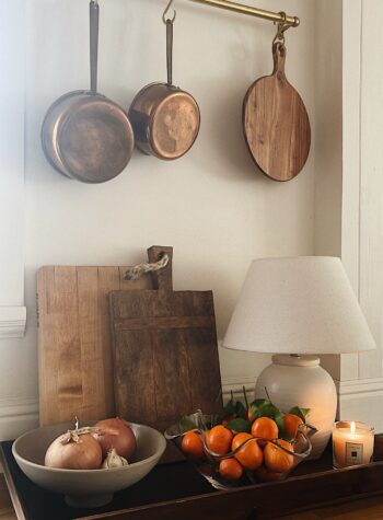 jessi caparella in san francisco devol brass copper pot rack nancy meyers kitchen styling