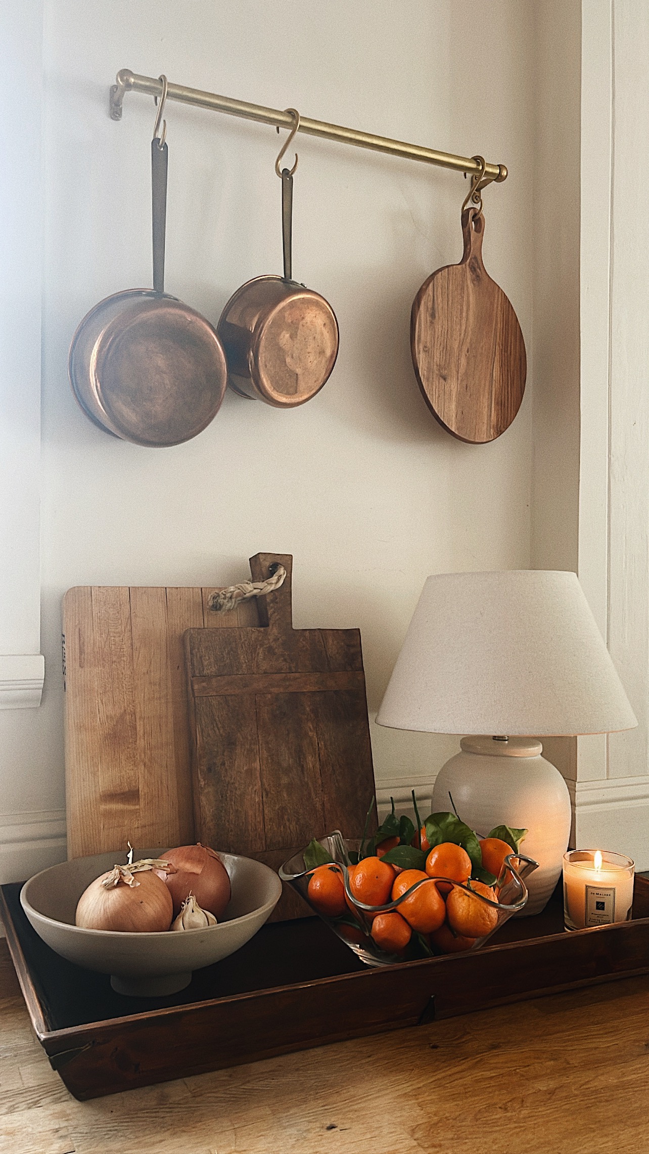 jessi caparella in san francisco devol brass copper pot rack nancy meyers kitchen styling