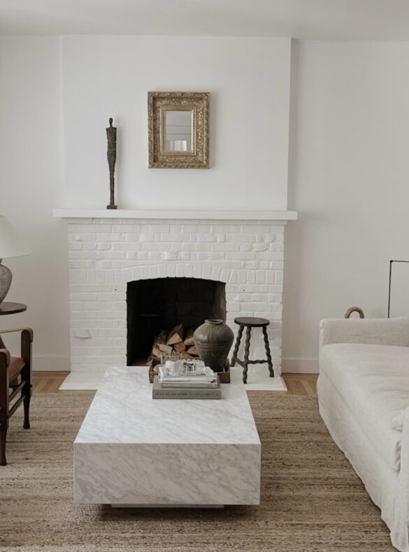 safari chairs, slipcover ikea farlov, marble restoration hardware coffee table, josh young design house, shell sconces