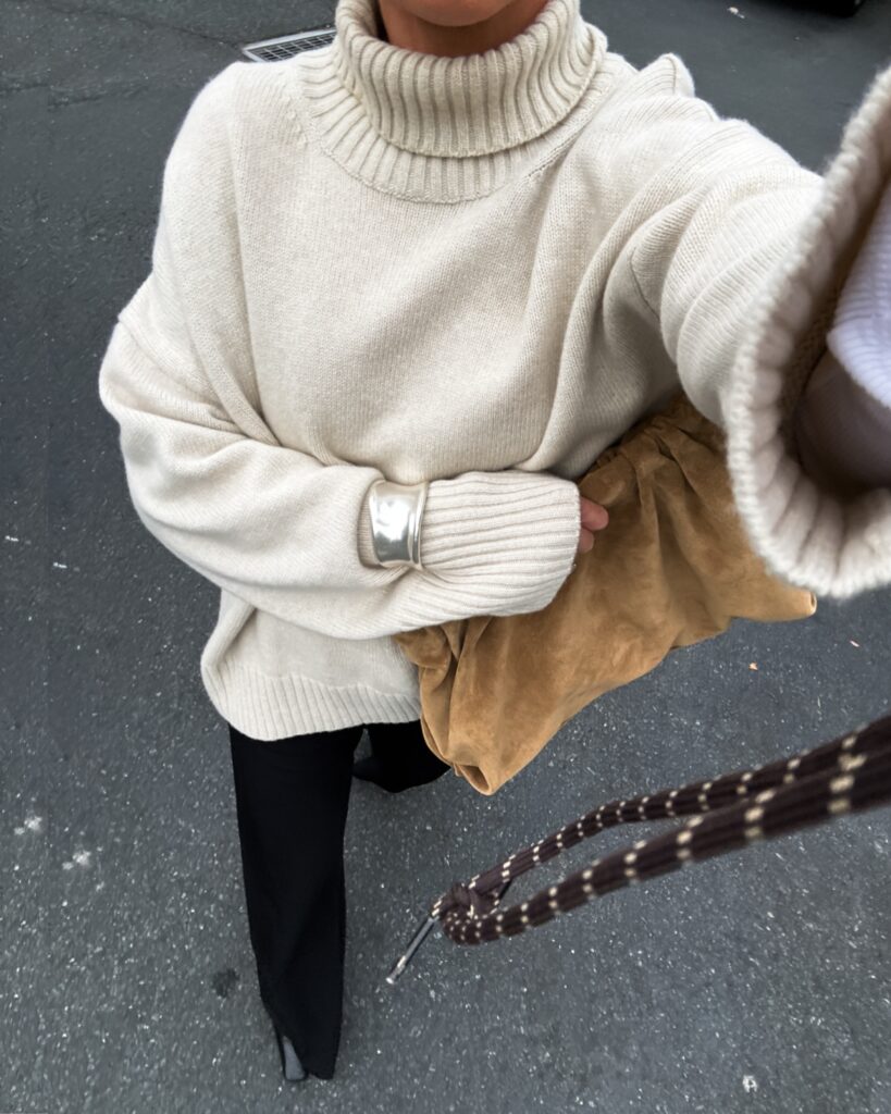 ootd selfie styling la ligne colby pants with an oversized turtleneck and khaite nevada boots. la ligne discount code jessi10