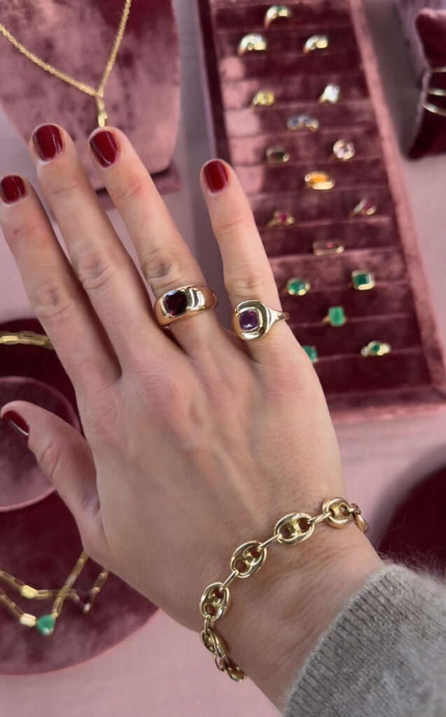 starling gold ring stacks with sapphire emerald cut bezel set and ruby gold signet pinky ring